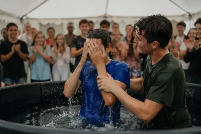 Teen Baptism Celebration Under White Canopy