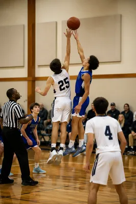Teen Basketball Jump Ball in Church Gym