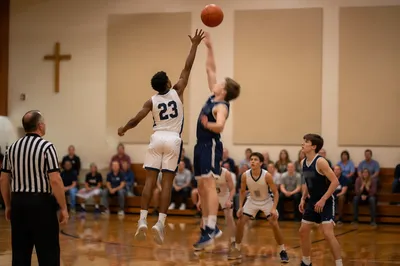 Teen Basketball Jump Ball in Church Gym