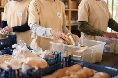 Teen Volunteers Sorting Donations at Church Pantry