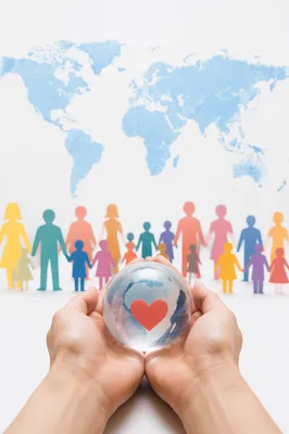 Hands Holding Globe for Global Outreach