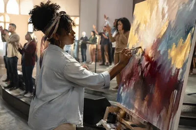 Artist Painting During Church Service