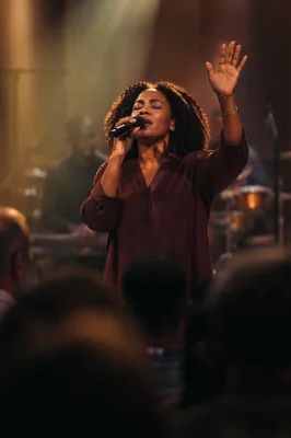 Worship Leader Singing on Church Stage