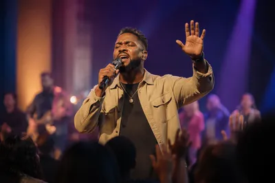 Worship Leader Singing on Church Stage