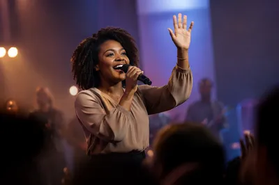 Worship Leader Singing on Church Stage