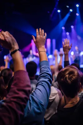 Teens Worshiping in Contemporary Church Auditorium
