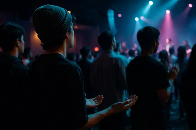 Teens Worshiping in Modern Church Auditorium