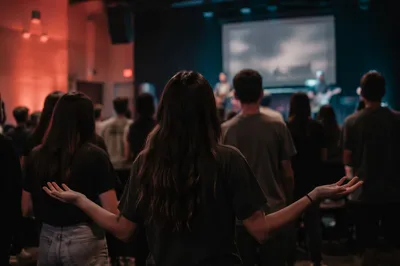 Teens Worshiping Together in Modern Church