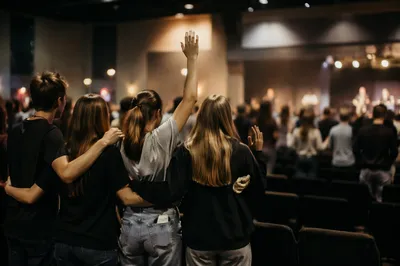 Teens Worship Together in Church Auditorium