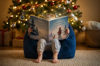 Child Reading Magical Winter Picture Book