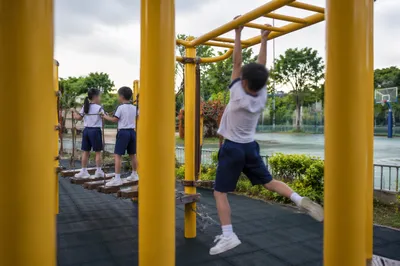 Children Playing at School Recess Playground