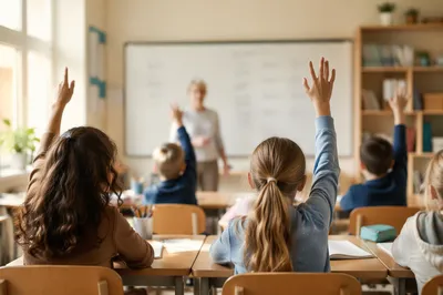 Elementary Classroom Children Raising Hands