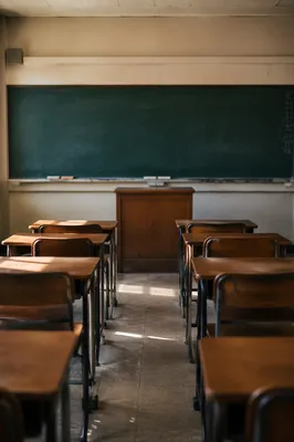 Empty Nostalgic Classroom with Chalkboard View
