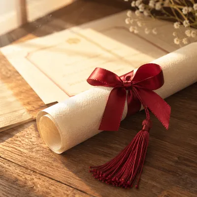 Close-Up Diploma Scroll with Red Ribbon