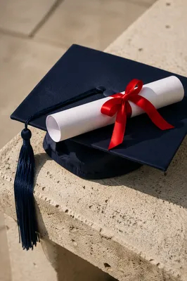 Graduation Cap and Diploma Celebration Close-Up