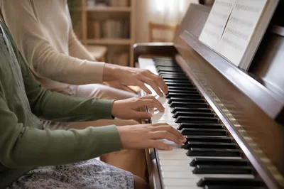 Child Piano Lesson Practice at Home