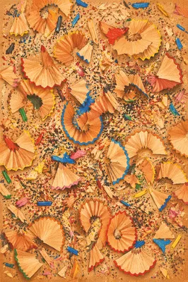 Colored Pencil Shavings Across Classroom Desk