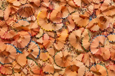 Colorful Pencil Shavings on Classroom Desk