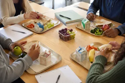 School Cafeteria Lunch with Friends Overhead
