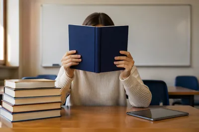 Focused Student Reading in Calm Classroom