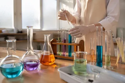 Colorful Science Lab Beakers in Morning Light