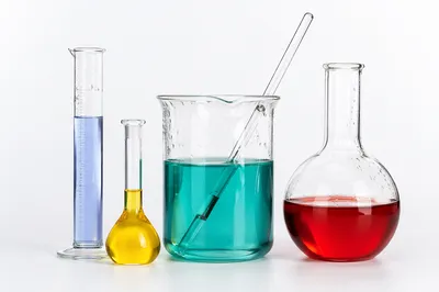 Colorful Science Lab Glassware on White