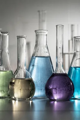Colorful Chemistry Glassware on Laboratory Bench