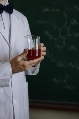 Chemistry Beaker in Classroom Lab Scene