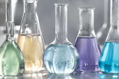 Colorful Chemistry Glassware on Laboratory Bench