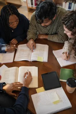 College Study Group Around Library Table