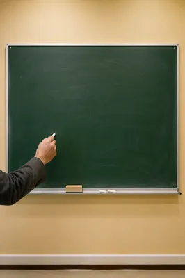 Teacher Hand Beginning Lesson at Chalkboard