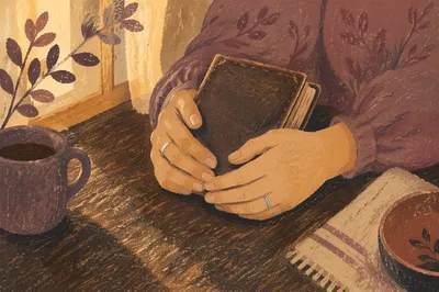 Hands Clutching Bible in Quiet Anxiety