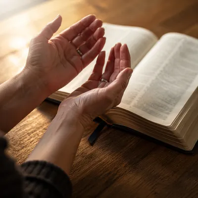 Anxious Hands Reaching for Biblical Comfort