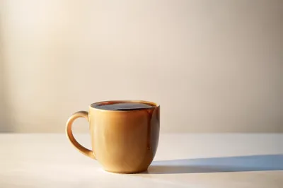Overflowing Coffee Cup in Golden Morning Light