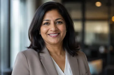 Confident Businesswoman Smiling in Modern Office