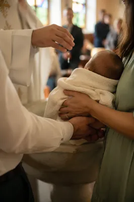 Joyful Family Baptism in Warm Church Light
