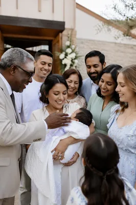 Family Gathering Outside Church After Baptism