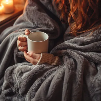 Cozy Blanket Comfort in Warm Candlelight