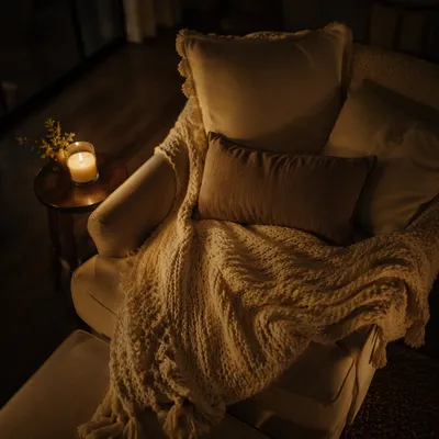 Warm Candlelit Blanket for Quiet Comfort