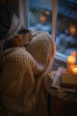 Quiet Comfort by Candlelit Window Seat