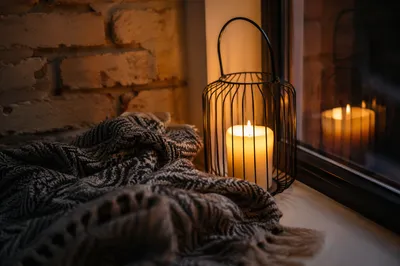 Cozy Blanket and Candlelight Comfort