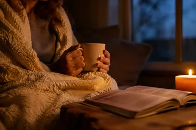 Candlelit Comfort with Warm Blanket