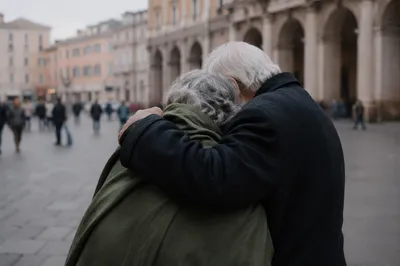 Compassionate Embrace Between Elderly Friends