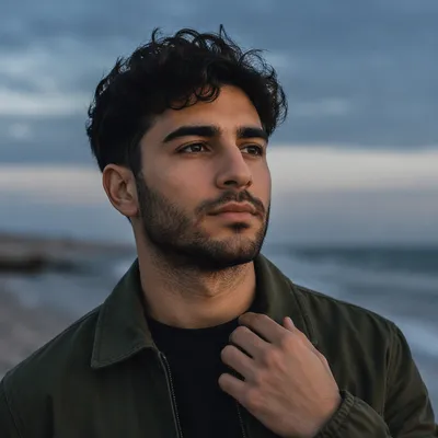 Thoughtful Man at Blue Hour Shoreline