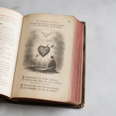 Vintage Devotional Book with Heart Illustration