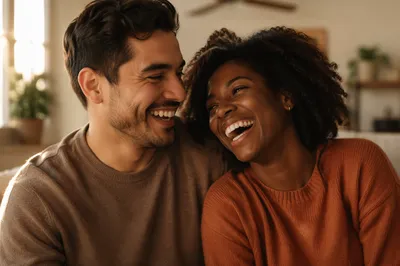 Joyful Interracial Couple Laughing in Warm Light