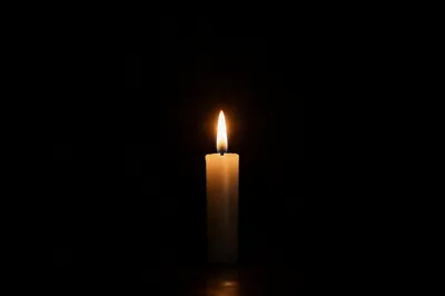 Single Candle of Courage in Darkness
