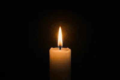 Single Candle of Courage in Darkness