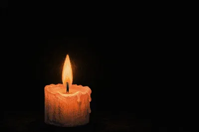 Single Candle of Courage in Darkness