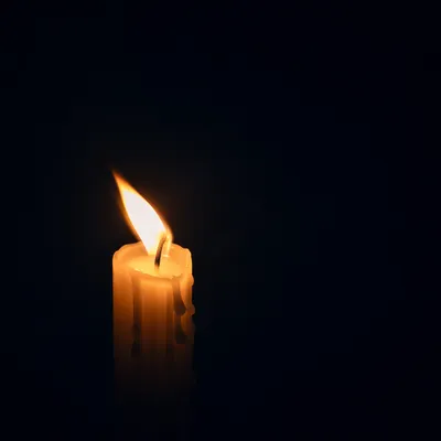 Single Candle of Courage in Darkness